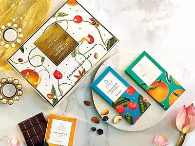 Smoor Dark Bar Assorted Celebrations Pack of 3 Zesty Orange, Cranberry, Dry Fruits 80 gm x 3 Smoor Dark Bar Assorted Celebrations Pack of 3 Zesty Orange, Cranberry, Dry Fruits 80 gm x 3